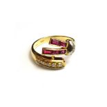 An 18ct gold, ruby and diamond set ring,