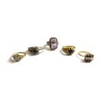 A 9ct gold and colourless gem set cluster ring, an amethyst set single stone ring, a 9ct gold,