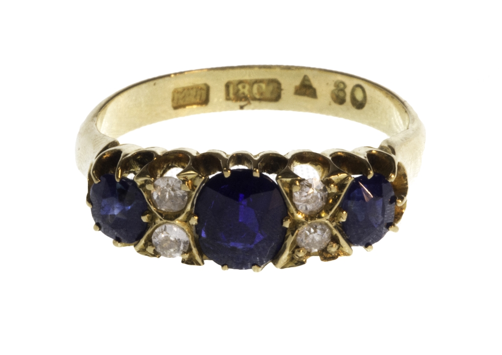 A gold, sapphire and diamond set ring,