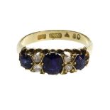 A gold, sapphire and diamond set ring,