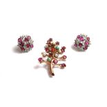 A pair of white gold, ruby and diamond set cluster earclips,