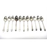 Seven silver bottom marked tablespoons,