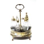 A George III silver cruet stand, of oval form with pierced and engraved decoration,