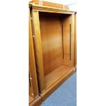 A 20th century oak floor standing open bookcase on plinth base, 125cm wide.