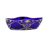 An Art Nouveau blue glass and silver overlay shaped bowl, probably American,