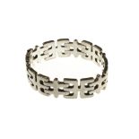 A Georg Jensen silver bracelet, in a wide abstract curved link design, on a snap clasp,