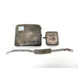 A silver rectangular vesta case, with floral, foliate and scroll engraved decoration, Chester 1905,