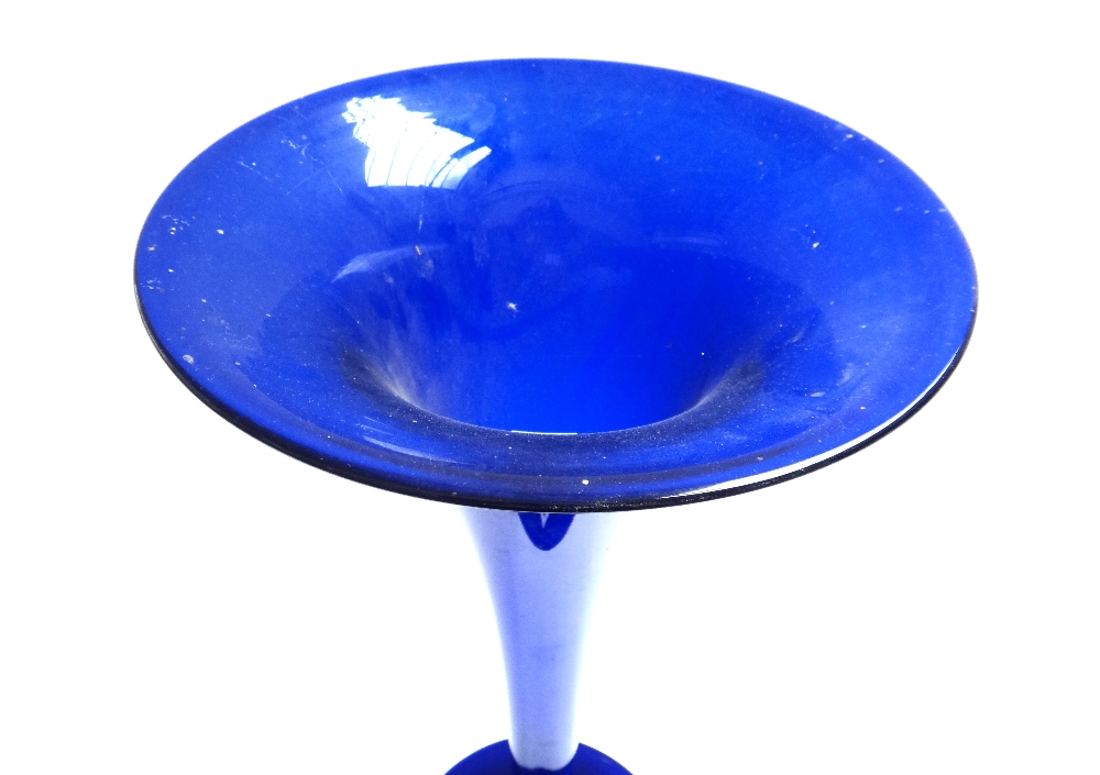 A Bristol blue glass vase of slender trumpet form, on a large circular foot, 56.5cm high. - Image 2 of 2