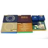 A collection of British coinage, comprising, fourteen year type specimen coin sets, with card cases,