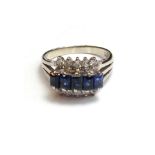 A white gold, sapphire and diamond set ring,