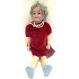A Simon and Halbig bisque head doll, early 20th century, with sleep eyes, open mouth,
