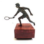 'Tennis Player' A Curtis Jere patinated bronze figure, late 20th century,