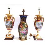 Three porcelain vases mounted as table lamps, the pair circa 1830, the single late 19th century,