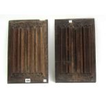 A pair of 16th century carved oak linen fold panels, each approx 27cm x 42cm.