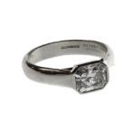 A Tiffany & Co platinum and diamond set single stone ring,