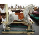 A vintage wooden rocking horse, mid 20th century,