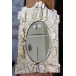 A 19th century Dieppe carved ivory arch top wall mirror,