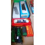Two Airfix 00 gauge locomotives, class 31 Diesel BR green livery and a GWR Prairie tank locomotive,
