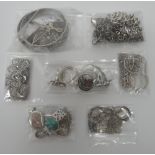 Mostly silver jewellery, comprising; two oval bangles, five bracelets,