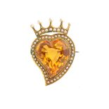 A gold, citrine and seed pearl set brooch, designed as a witches heart with a crown above,
