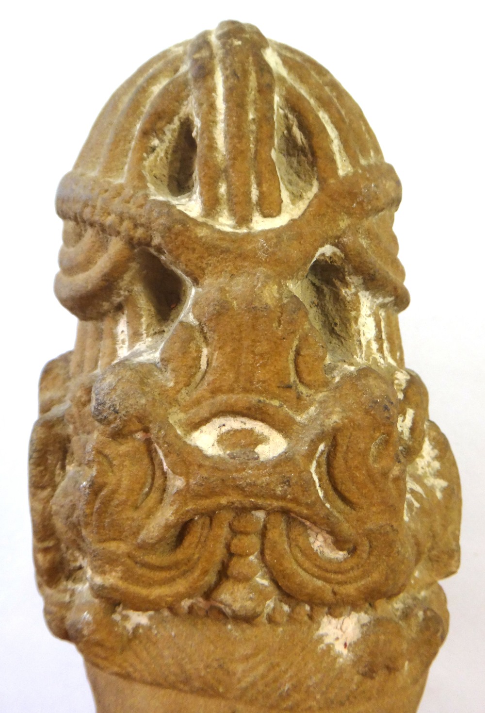 A sandstone head of a deity, Central India, circa 11th/12th century,wearing a tall headdress, (a. - Image 3 of 5