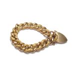 A gold decorated and plain curb link bracelet, detailed 9 C,