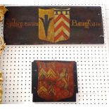 Four 18th century oak panels, each later painted with shield shaped heraldic crests,