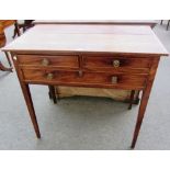 A George III mahogany and pine three drawer side table on tapering square supports, 85cm wide.