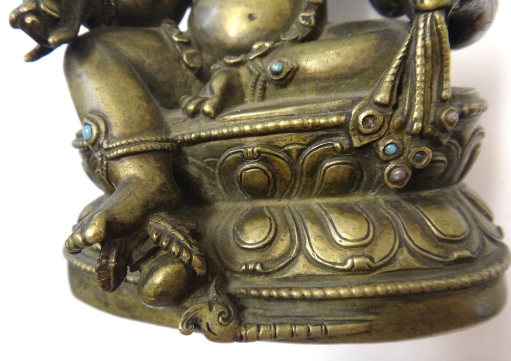 A good Tibetan cast brass figure of Kubera, circa 15th century, - Image 5 of 15