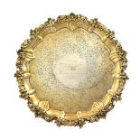 A Scottish silver salver of shaped circular form, with a floral,