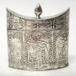 A silver oval hinge lidded tea caddy, embossed with scenes of figures with dogs,