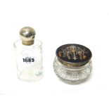 A French silver mounted faceted glass toilet bottle,