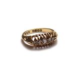 An 18ct gold and diamond set five stone ring,