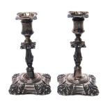 A pair of Victorian silver small candlesticks,
