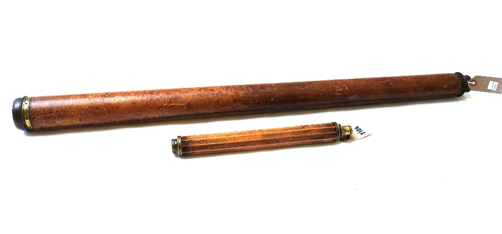 A brass and wooden bound single draw telescope, 19th century, of faceted form, 60cm extended,