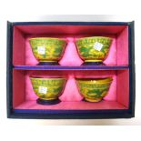 A set of four Chinese yellow ground teabowls, 20th century,