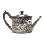 A George III silver teapot, of oval form, with later floral,