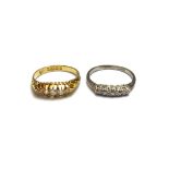 An 18ct gold and diamond set five stone ring,