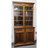 A late 19th century inlaid mahogany bookcase cabinet,