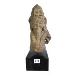 A stone head of a sage, Central India, circa 11th/12th century,
