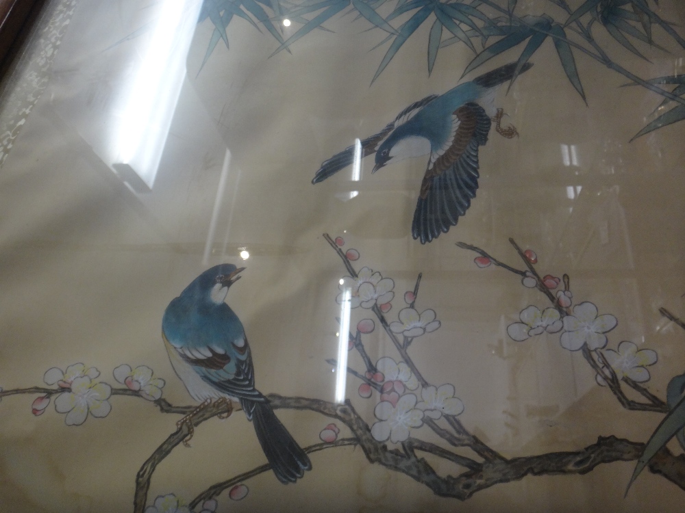 A large Chinese painting on silk, 20th century, painted with birds amongst flowering prunus, - Image 5 of 6