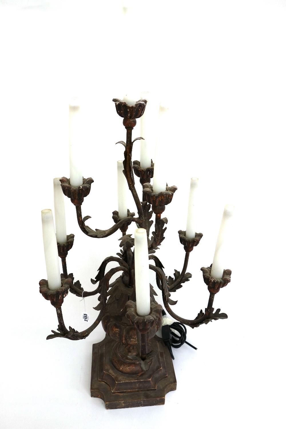 A painted carved wooden ten branch candelabrum table lamp, on a shaped, stepped square base,