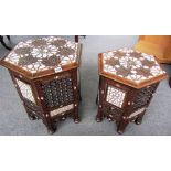 A graduated pair of late 19th century Moorish mother of pearl inlaid carved hardwood hexagonal