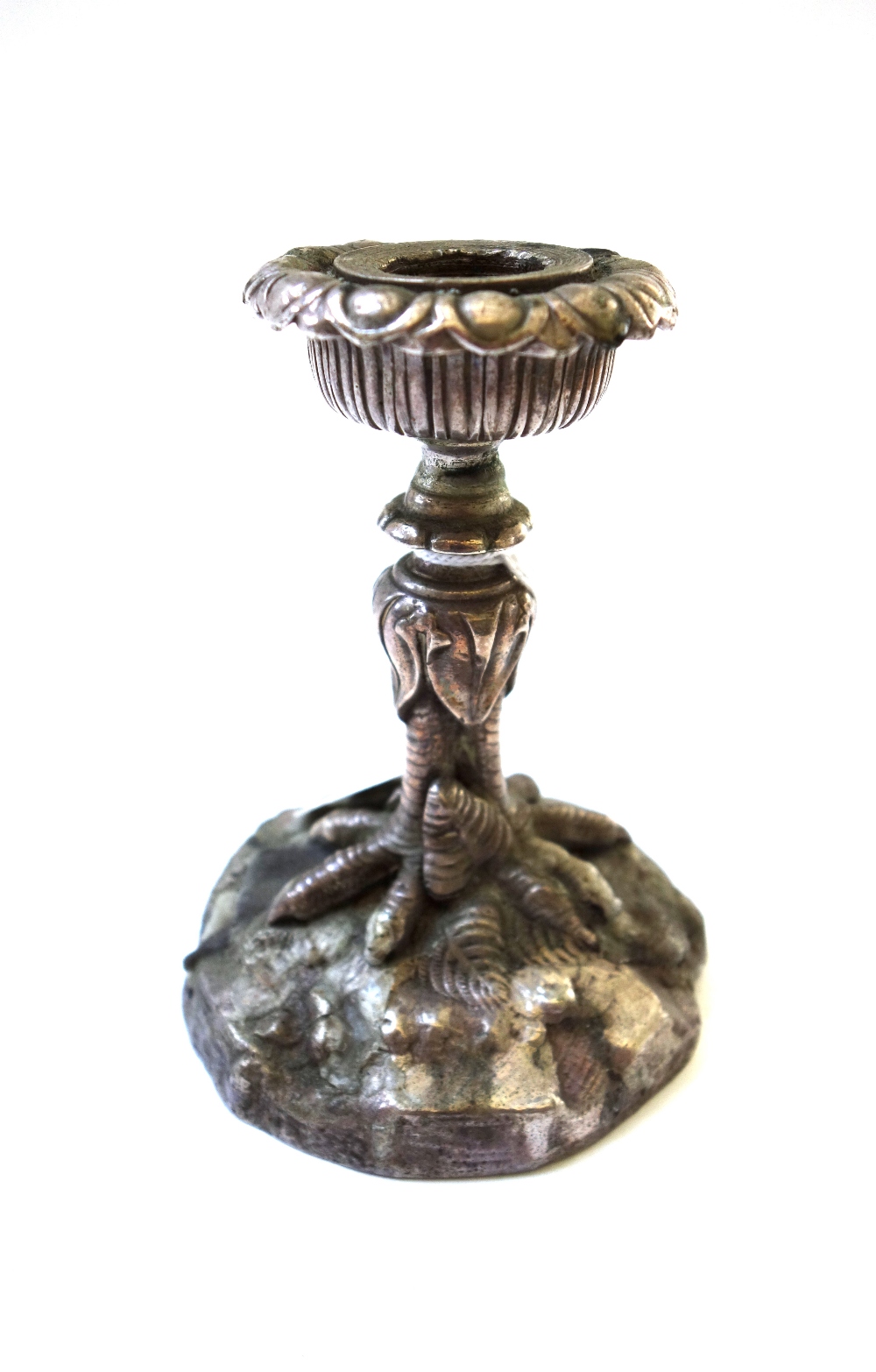 A silvered bronze candlestick, 20th century,