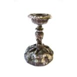 A silvered bronze candlestick, 20th century,