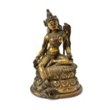 A Tibetan gilt bronze figure of Green Tara, 16th century,