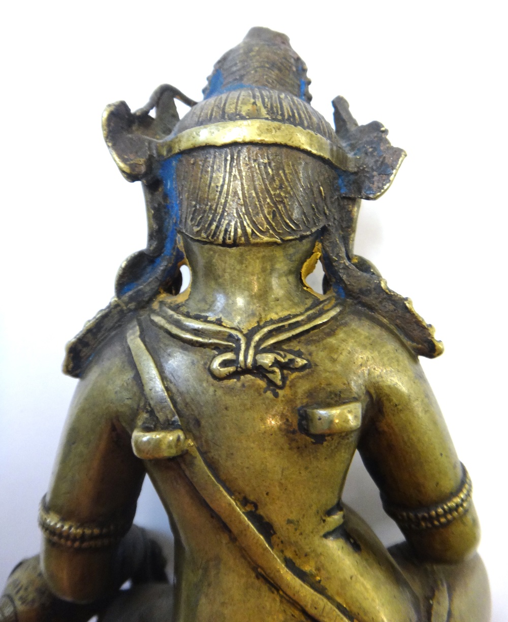 A good Tibetan cast brass figure of Kubera, circa 15th century, - Image 11 of 15