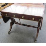 A Regency mahogany sofa table with opposing frieze drawers, on trestle end standards, 91cm wide.
