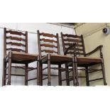 A set of six oak and ash 18th century style wavy ladder back chairs, to include a pair of carvers.