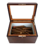 A mahogany humidor containing a quantity of vintage cigars, including Gallo Fino Jamaica,